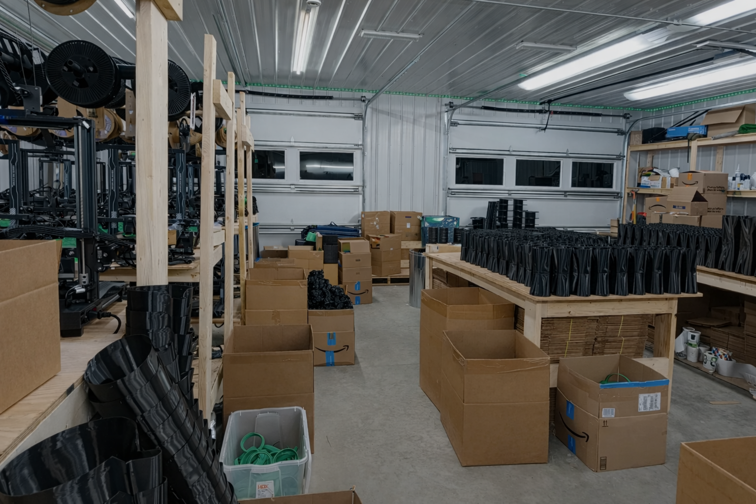 Small product workshop where ecommerce inventory is assembled, packed, and prepared for shipping.